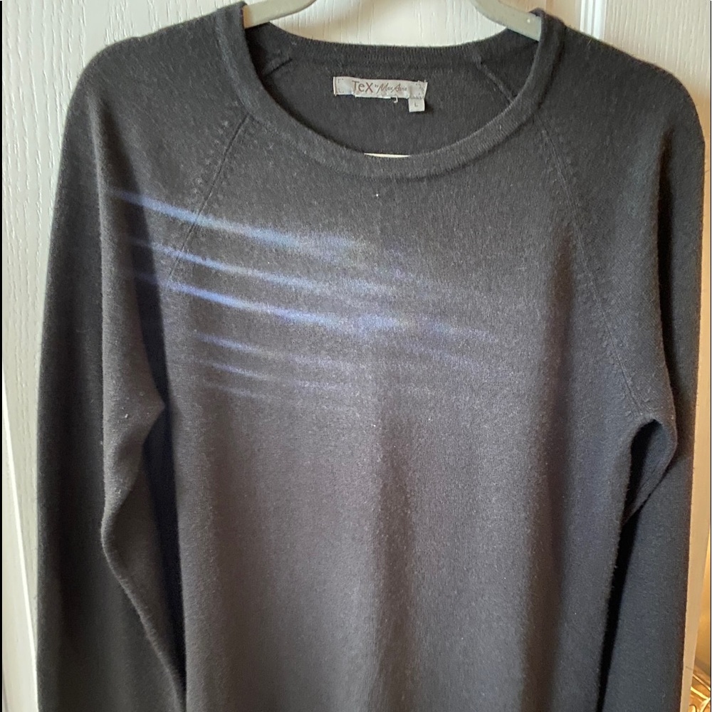 Awesome grey sweater.